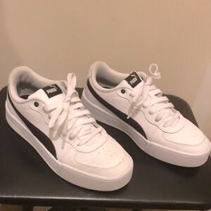 Puma Ladies Classic White and Black Sneakers 8 1/2. Like New